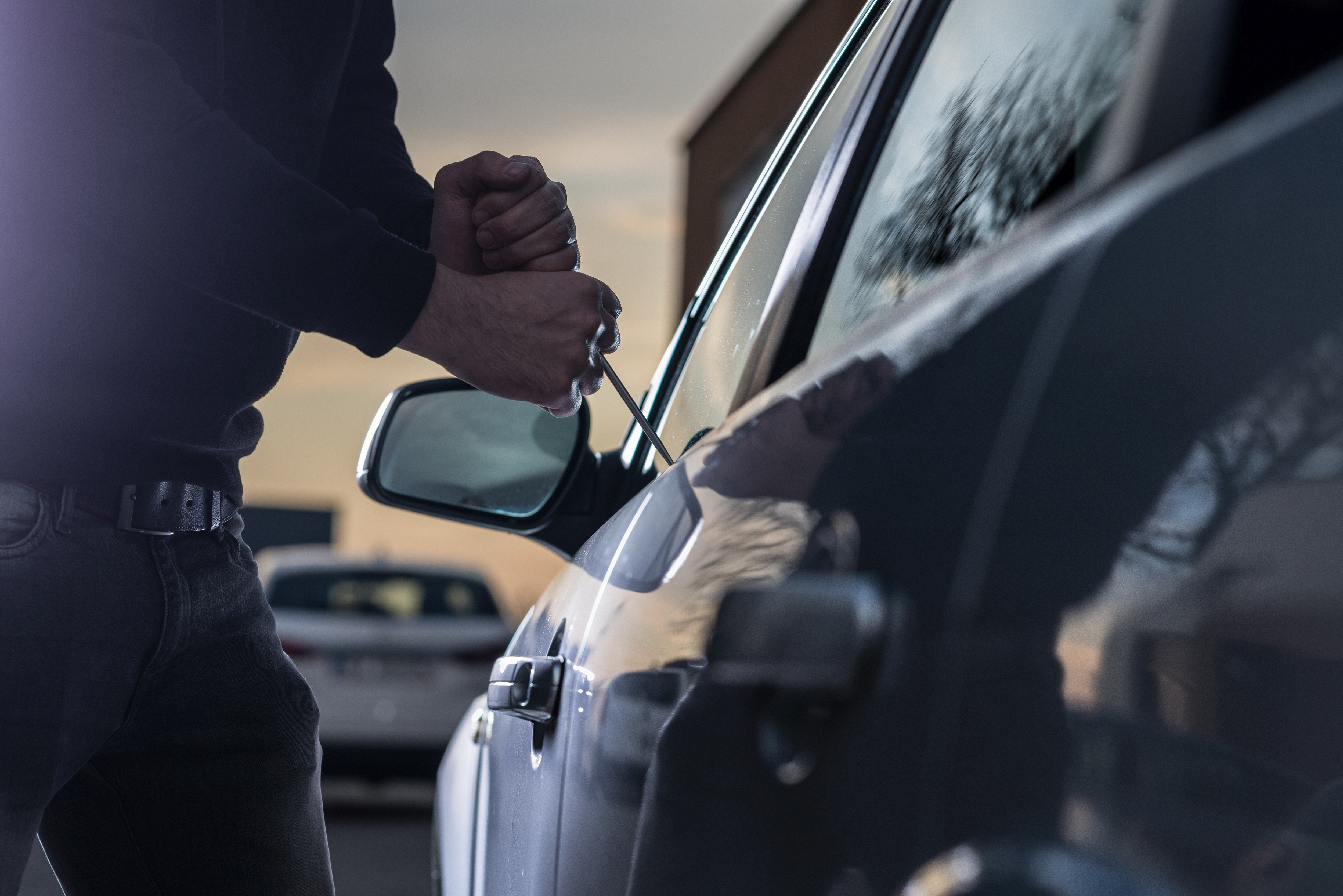 Auto,Thief,In,Black,Balaclava,Trying,To,Break,Into,Car