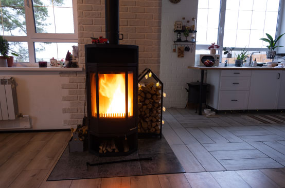 Fireplace burning in cozy modern room.