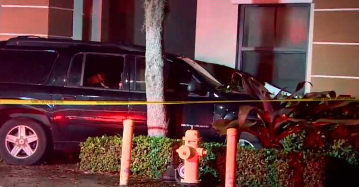 Driver rushed to hospital after crashing into apartment complex in NW Miami-Dade