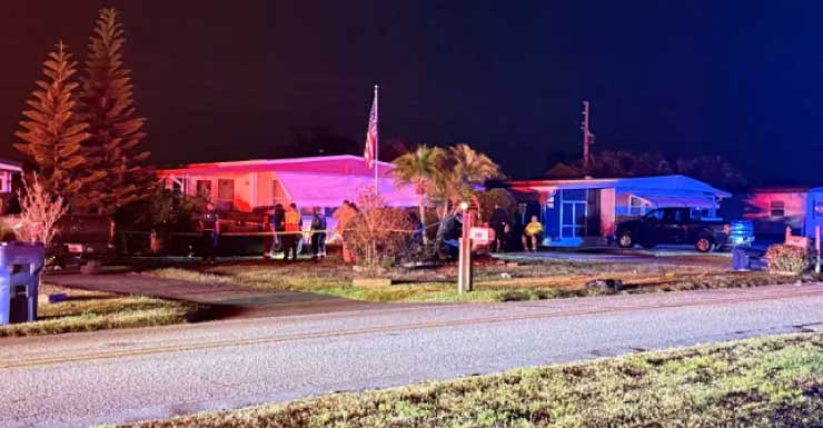 Car flips after crashing near Palm Harbor home