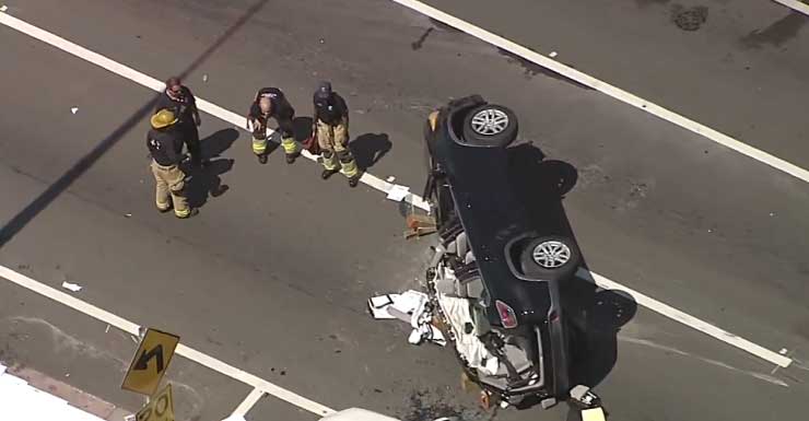 Elderly woman extricated from SUV that flipped after crash in Miami Beach
