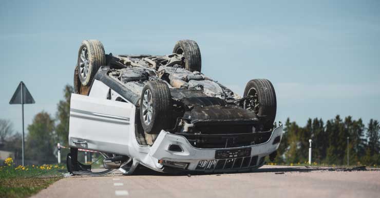 Car overturns on Back Beach Road; no serious injuries reported