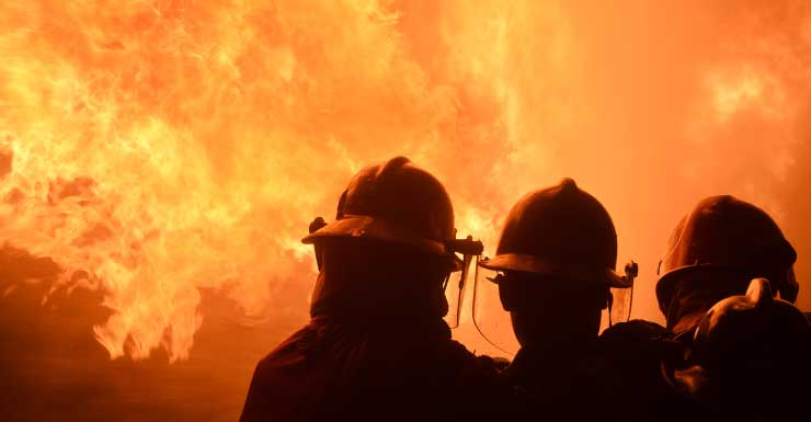 Fire spreads from vehicle and engulfs detached garage in Bonita Springs