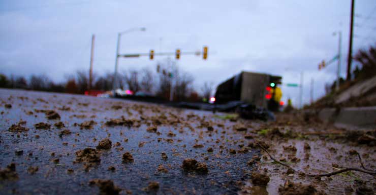 Fully loaded dump truck overturns on Nassau County roadway after Jacksonville man loses control of vehicle: Florida Highway Patrol