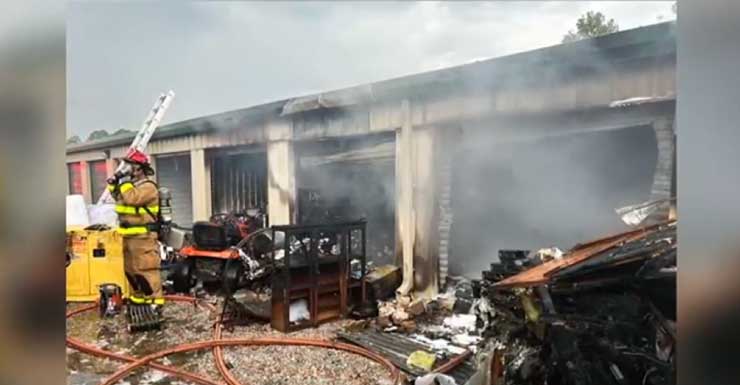 One arrested after storage building catches fire