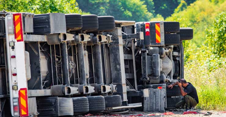 Overturned dump truck, possible fuel spill cause shut down on Rock Hill Road in DeFuniak Springs
