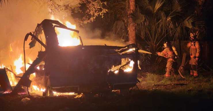 Pull-behind camper catches fire in Fort Myers