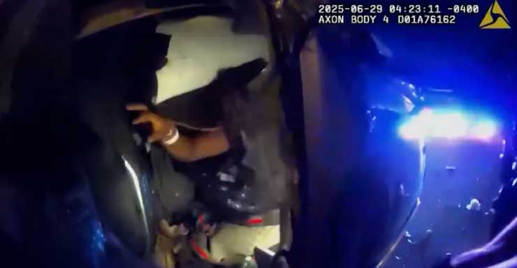 VIDEO: Tampa officers rescue driver stuck in flipped car on fire