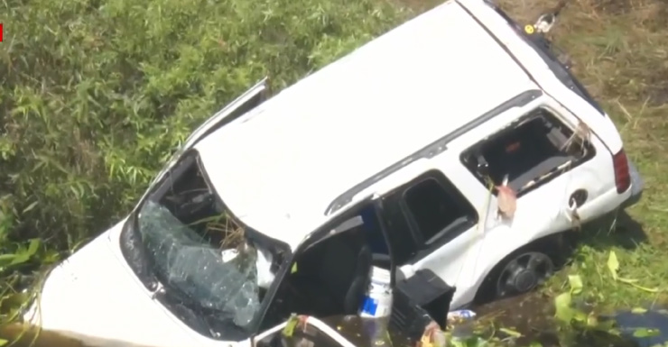 Body found after SUV plunges into canal off US 27 in Weston