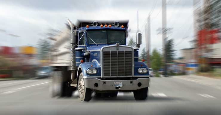 Fatal crash between dump truck and car closes road in Polk County