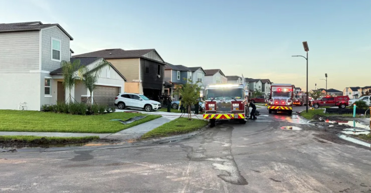 Pasco firefighters rescue adult, child trapped in burning home