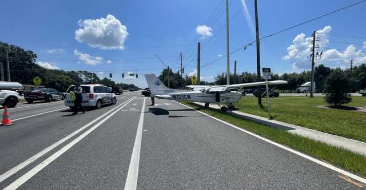 Small plane lands on Kissimmee road, hits vehicle