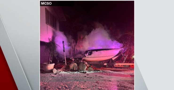 Boat fire spreads to home in Marathon
