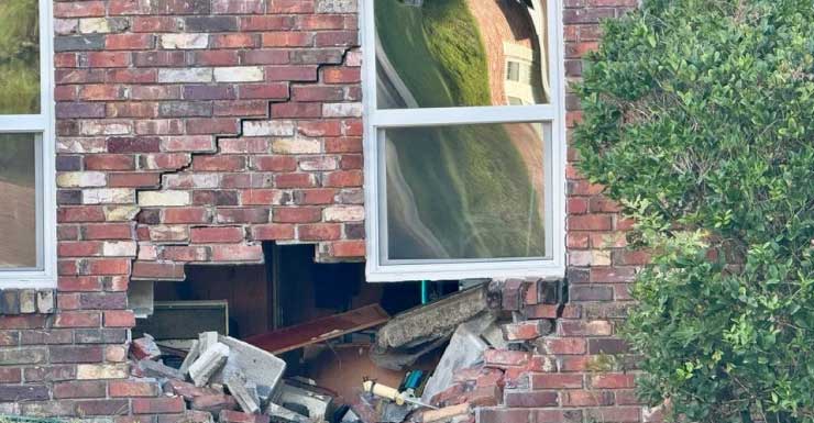 Car crashes into Escambia County home after fleeing from deputies