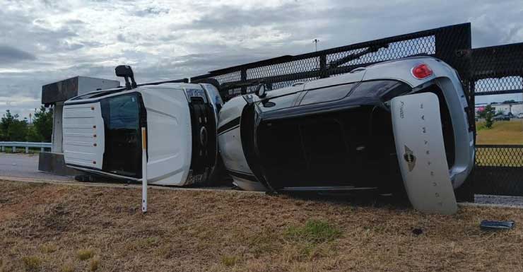 Pickup truck hauling trailer overturns on I-110 entrance ramp in Pensacola