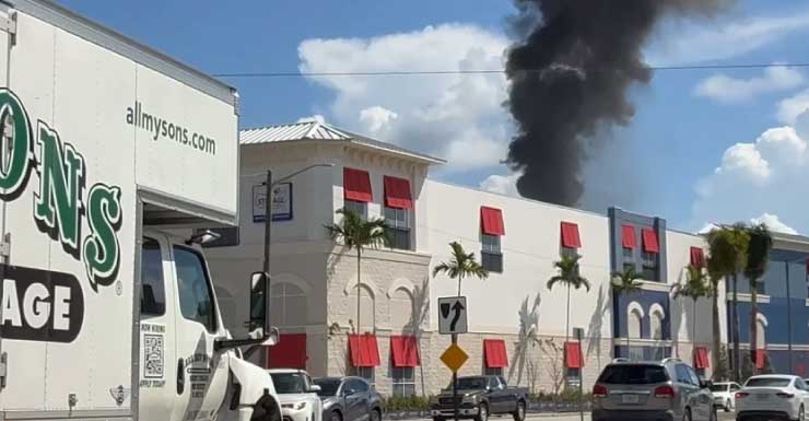 Firefighters battle blaze on roof of unfinished storage facility in Mangonia Park