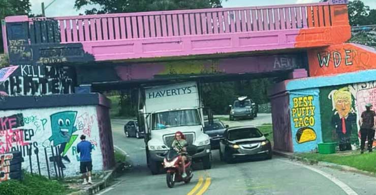 'Havertys' box truck gets stuck under Pensacola's Graffiti Bridge