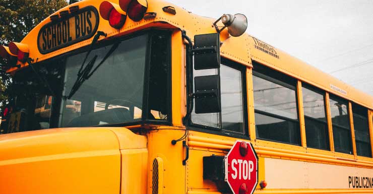 Okeechobee school bus crash sends nine to hospital after car crosses center line