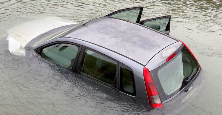 Body camera video shows police response after woman drove car into lake, killing passenger