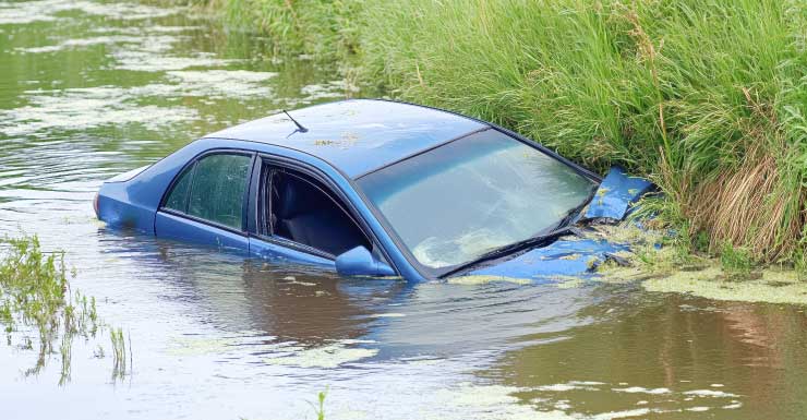 Teen dead after driving car into canal near Wellington