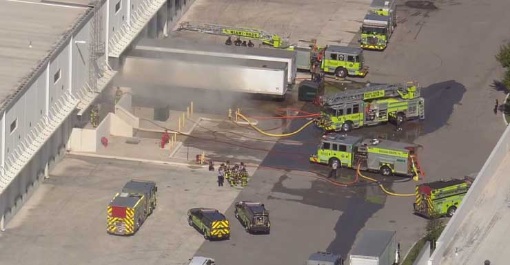 Crews battle warehouse fire in Medley