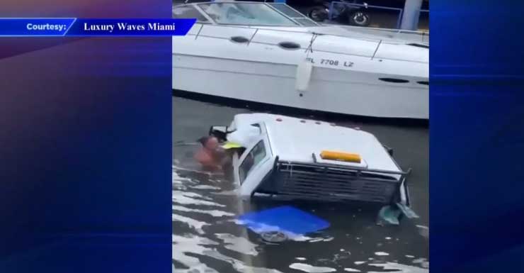 Good Samaritan rescues driver, passenger after truck rams through tree, crashes into boat on river