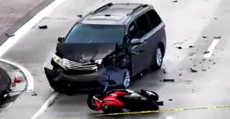 Motorcycle, SUV crash shuts down road in Hallandale Beach