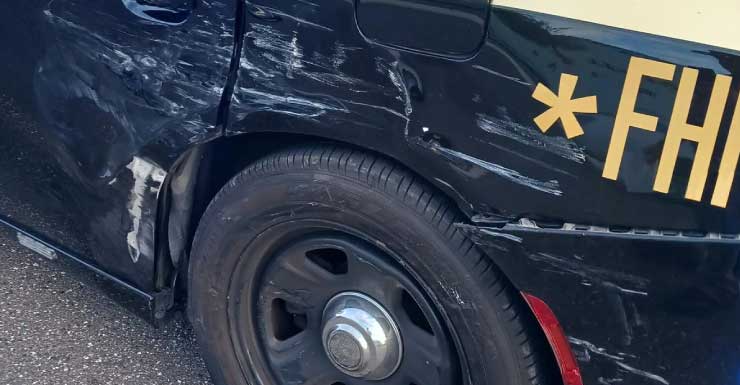 State trooper vehicle damaged after getting hit during traffic stop