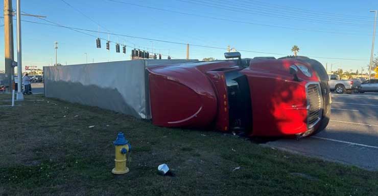 Tractor-trailer overturns at US-19 and State Road 52 in Pasco County