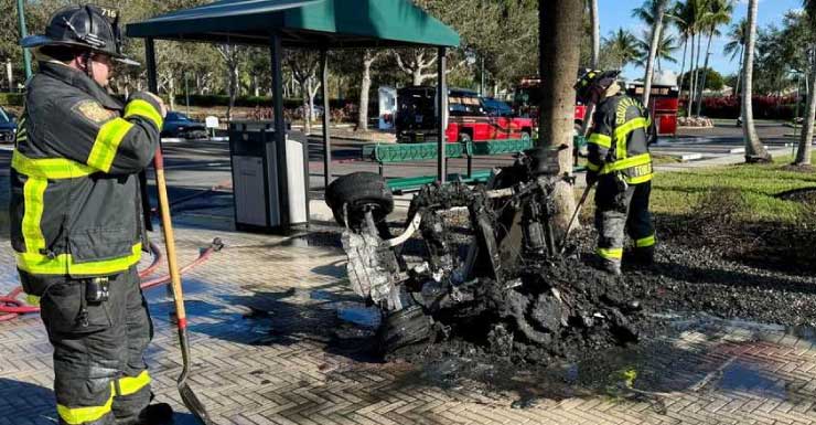 Golf cart engulfed by flames near structure at Legends Golf and Country Club in Lee County