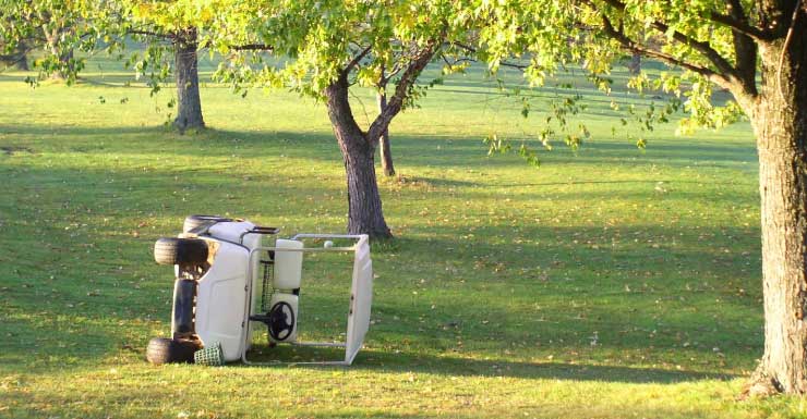 Golf cart and landscaping vehicle collide at gate in The Villages