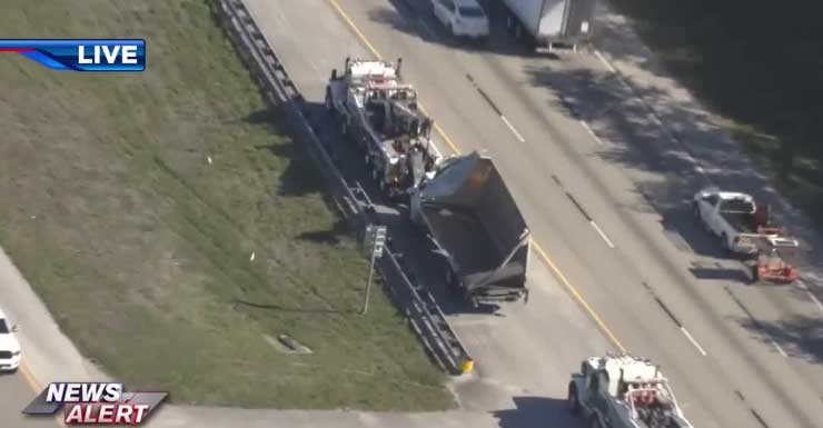 1 hospitalized after dump truck hits box truck on Sawgrass Expressway in Tamarac
