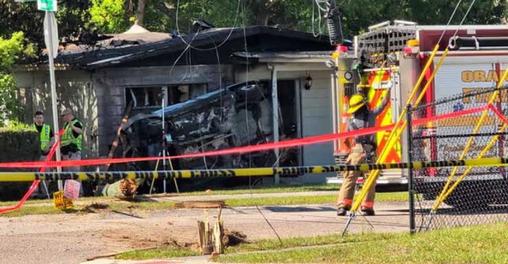 2 dead after car crashes into South Apopka home, catches fire