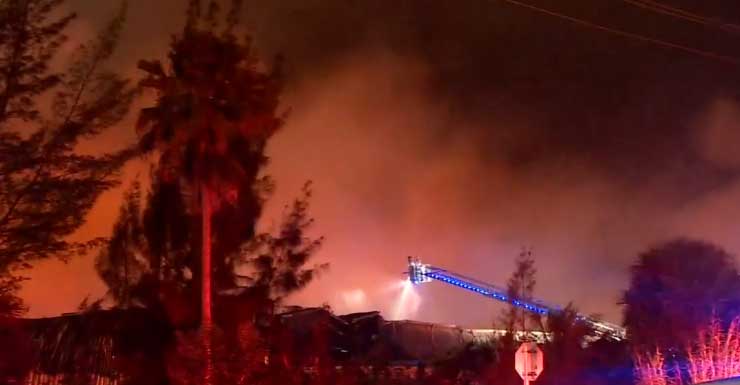 Crews battling 5-alarm warehouse fire near Turnpike in NW Miami-Dade