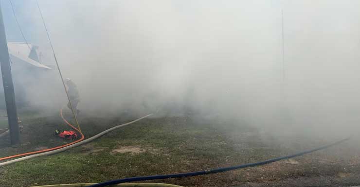 Crews battle house fire on Wood Valley Road