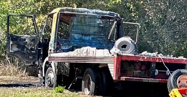 Crews put out vehicle fire behind The Carpet Market on Lillian Highway