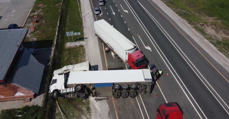 A wreck in Northwest Miami-Dade involving work truck with attached trailer causes traffic