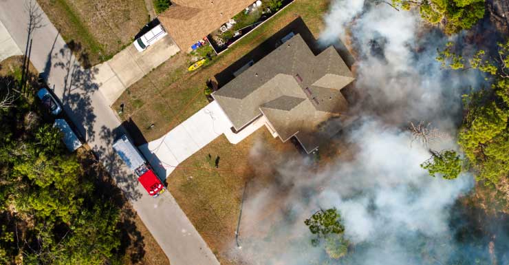 Cape Coral house left in unlivable condition after fire sparks over garage