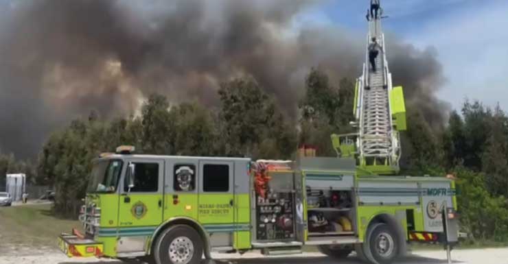 Firefighter hospitalized after suffering allergic reaction while fighting West Miami-Dade brush fires; over 18K acres burned