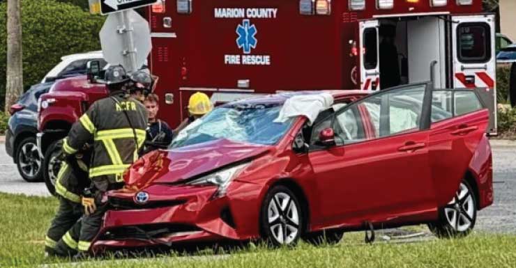 Firefighters extricate one person from car after three-vehicle crash in Summerfield