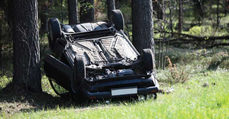 Hollywood rollover crash sends car into home, narrowly missing sleeping residents