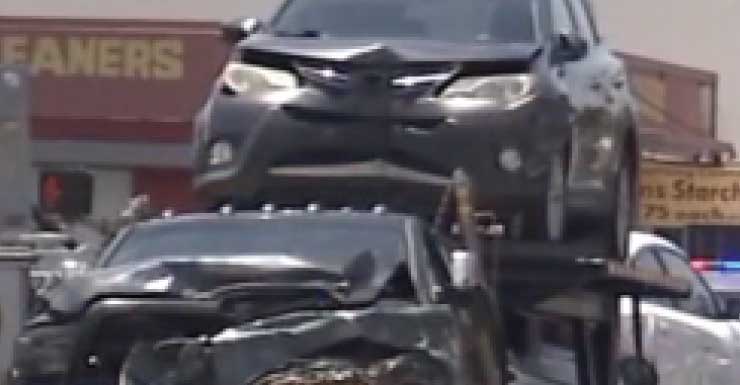 2 teen boys killed when pick-up hauling vehicles on trailer plows into their car on Edgewood Avenue