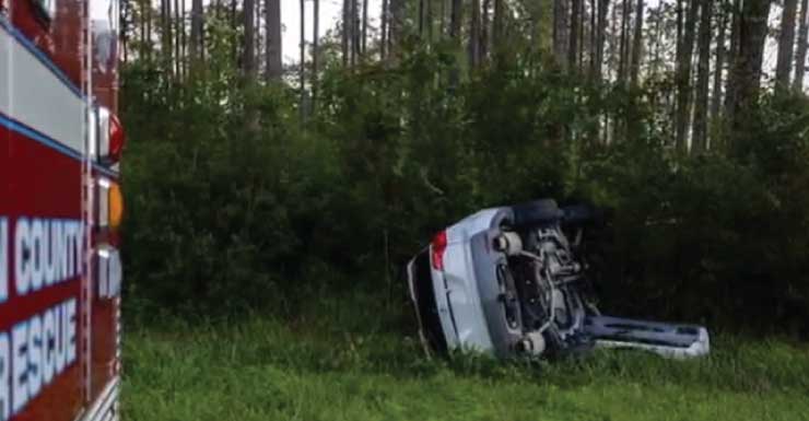 Car flips over in Silver Springs, all occupants escape safely
