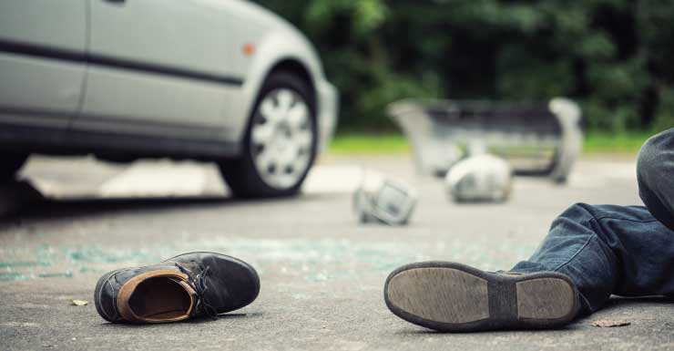 Driver hits, kills man cutting up downed tree on highway in Marion County