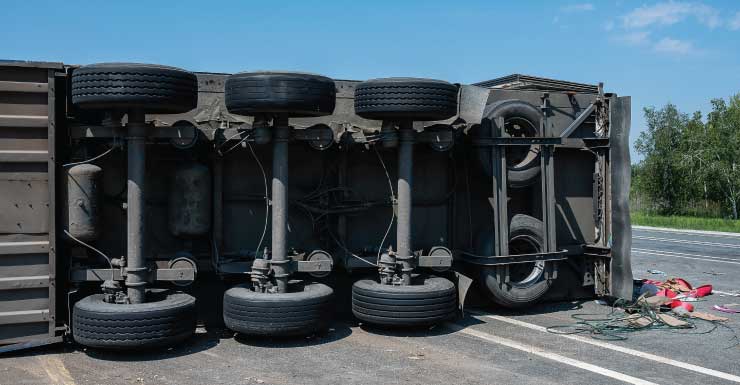Dump truck rollover crash snarls traffic on Palmetto Expressway in Miami-Dade