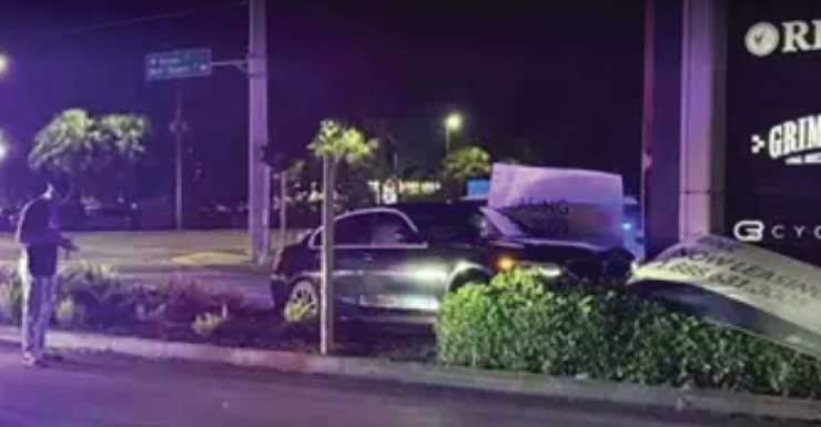 Car crashes into sign at Bell Tower Shops in Lee County