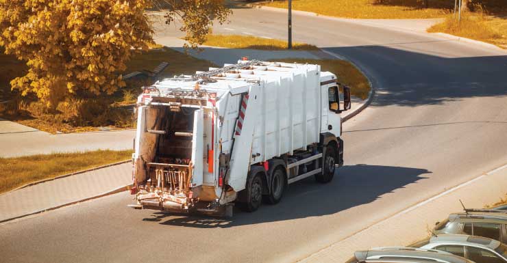 Elderly woman dies days after crashing into garbage truck, 2 mailboxes