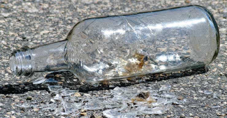 Woman hits co-worker with glass bottle at restaurant in Allapattah
