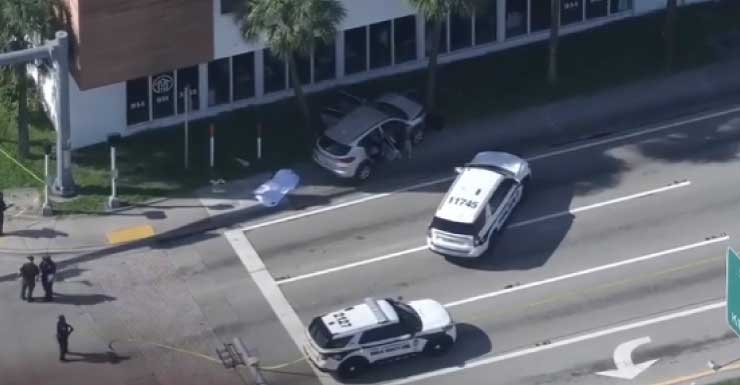 Body covered by tarp after pedestrian struck by SUV in Fort Lauderdale