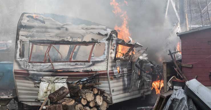 Camper catches fire on Pondella Road in North Fort Myers